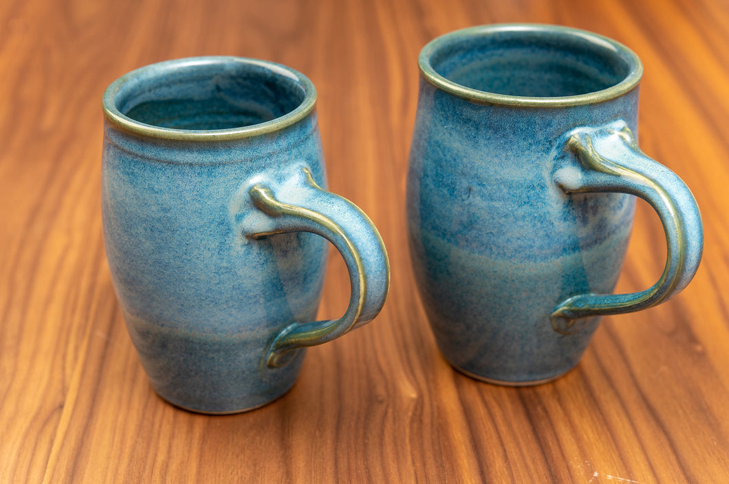 Blue glazed tall mugs