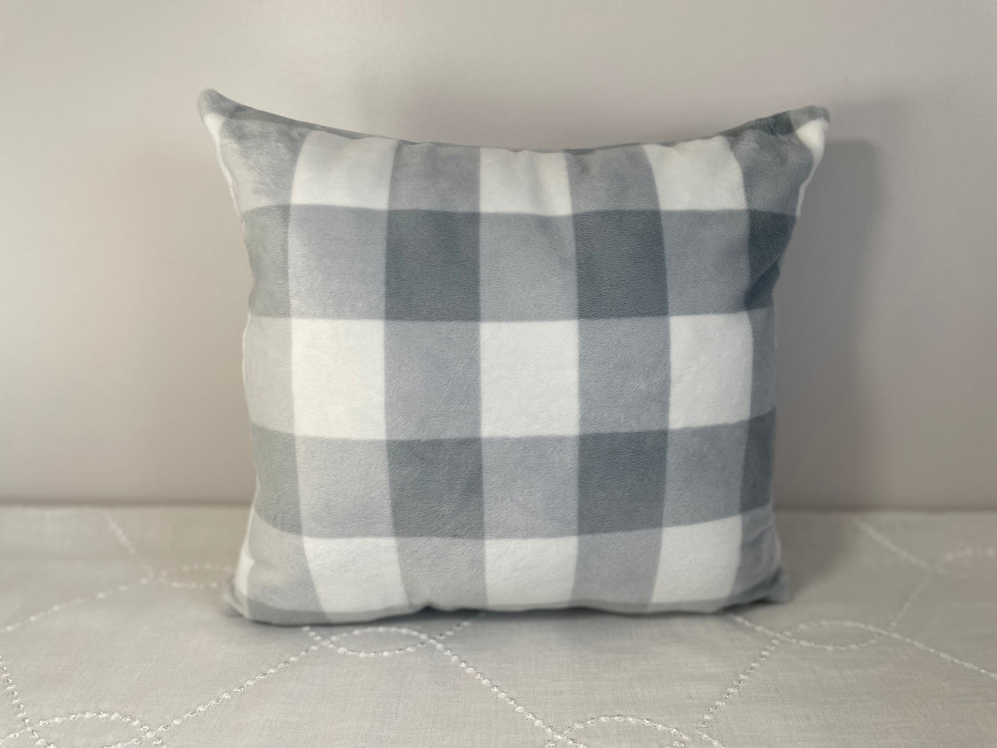White and grey gingham pillow